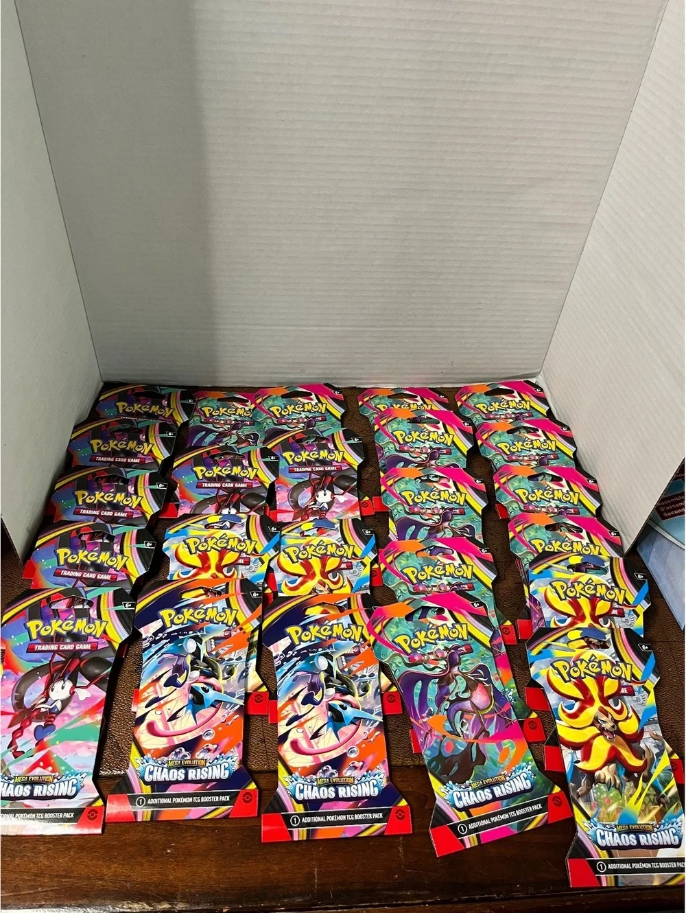 LOT of 24: 2026 Pokémon TCG: Mega Evolution Chaos Rising Booster Packs